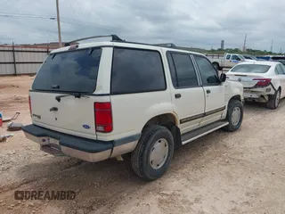 1991 Ford Explorer XL z VIN 1FMDU32X5MUA21535, wystawiony jako IAAI lot #42370194 z przebiegiem 83 911 mil mil oraz . Historia ofert i sprzedaży dostępna na DreamBid. Obrazek 4.