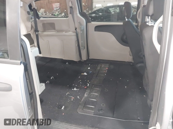 2019 Dodge Grand Caravan SE with VIN 2C4RDGBG3KR571537, listed as a IAAI auction lot 42036875 with 95,190 mi miles and . Bid and sale history available at DreamBid. Image 8.