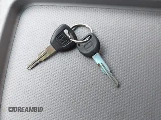 2000 Honda Odyssey LX z VIN 2HKRL1857YH570211, wystawiony jako IAAI lot #42139263 z przebiegiem 161 983 mil mil oraz . Historia ofert i sprzedaży dostępna na DreamBid. Obrazek 11.