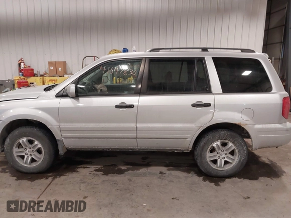 2005 Honda Pilot EX-L with VIN 2HKYF18575H557005, listed as a IAAI auction lot 41647830 with 245,992 mi miles. Bid and sale history available at carsss.com. Image 14.