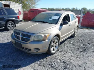 2010 Dodge Caliber SXT with VIN 1B3CB4HA4AD613312, listed as a IAAI auction lot 41746603 with 180,606 mi miles. Bid and sale history available at carsss.com. Image 2.