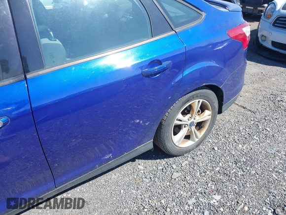2012 Ford Focus SE with VIN 1FAHP3F27CL248182, listed as a IAAI auction lot 41875527 with 105,075 mi miles. Bid and sale history available at carsss.com. Image 6.