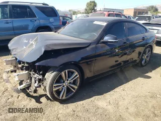 2015 BMW 4 Series 435i with VIN WBA4B1C54FD418309, listed as a Copart auction lot 65259404 with 110,713 mi miles and Salvage Title. Bid and sale history available at carsss.com. Image 1.