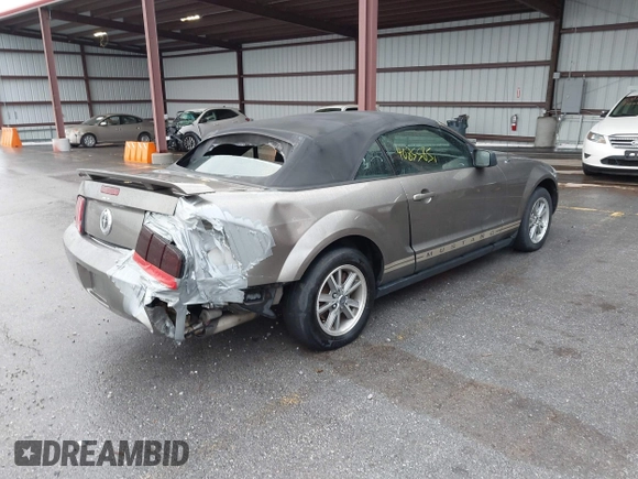 2005 Ford Mustang Deluxe with VIN 1ZVFT84N055214712, listed as a IAAI auction lot 40855851 with 98,307 mi miles. Bid and sale history available at carsss.com. Image 4.