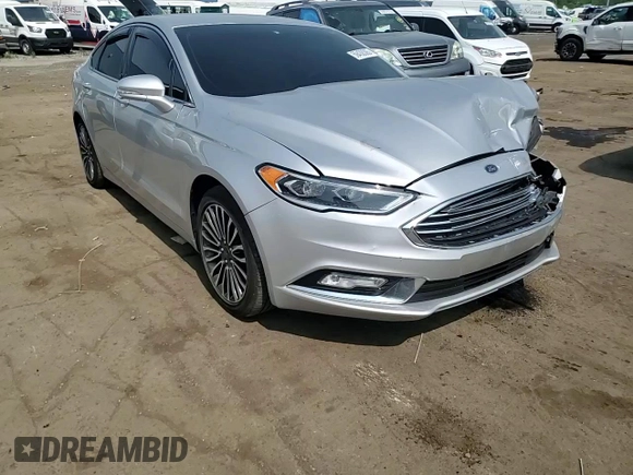 2017 Ford Fusion SE z VIN 3FA6P0HD0HR139771, wystawiony jako Copart lot #59438385 z przebiegiem 103 214 mil mil oraz Czysty tytuł • Clean title. Historia ofert i sprzedaży dostępna na DreamBid. Obrazek 13.