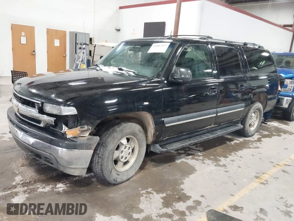 2002 Chevrolet Suburban Z71 with VIN 3GNFK16Z42G305930, listed as a IAAI auction lot 41002347 with 288,355 mi miles. Bid and sale history available at carsss.com. Image 17.