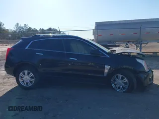 2016 Cadillac SRX Luxury Collection with VIN 3GYFNBE31GS544322, listed as a IAAI auction lot 41855688 with 128,934 mi miles. Bid and sale history available at carsss.com. Image 13.