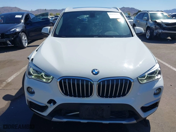 2017 BMW X1 xDrive28i with VIN WBXHT3C30H5F68187, listed as a IAAI auction lot 41830892 with 101,313 mi miles. Bid and sale history available at carsss.com. Image 12.
