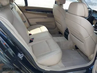 2010 BMW 7 Series 750Li with VIN WBAKB8C54ACY63650, listed as a IAAI auction lot 41961941 with 127,405 mi miles. Bid and sale history available at carsss.com. Image 8.