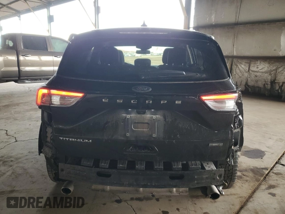 2020 Ford Escape Titanium Hybrid z VIN 1FMCU9DZ2LUB49050, wystawiony jako Copart lot #42517525 z przebiegiem 66 890 mil mil oraz Szkoda całkowita • Salvage title. Historia ofert i sprzedaży dostępna na DreamBid. Obrazek 6.
