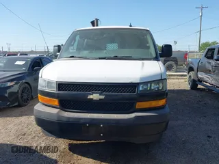 2018 Chevrolet Express Cargo Van with VIN 1GCWGAFP0J1182701, listed as a IAAI auction lot 42014825 with 206,702 mi miles. Bid and sale history available at carsss.com. Image 12.