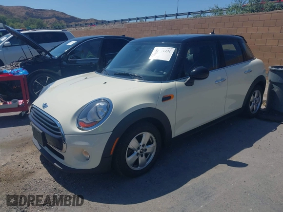 2016 MINI Hardtop 4 Door with VIN WMWXU1C56G2D10605, listed as a IAAI auction lot 42411431 with 35,367 mi miles and . Bid and sale history available at DreamBid. Image 2.