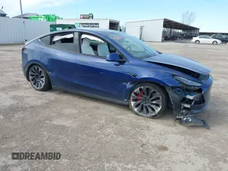 2021 Tesla Model Y Performance z VIN 5YJYGDEF8MF245641, wystawiony jako IAAI lot #41685230 z przebiegiem 25 903 mil mil oraz . Historia ofert i sprzedaży dostępna na DreamBid. Obrazek 6.