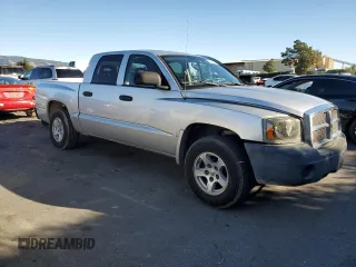 2007 Dodge Dakota SLT with VIN 1D7HE48K47S103248, listed as a Copart auction lot 82744094 with 126,126 mi miles and Salvage Title. Bid and sale history available at DreamBid. Image 4.