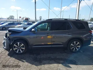 2025 Honda Pilot Touring with VIN 5FNYG2H73SB004351, listed as a IAAI auction lot 41699830 with 6,377 mi miles. Bid and sale history available at carsss.com. Image 14.