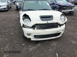 2013 MINI Hardtop S with VIN WMWSV3C51DT480022, listed as a IAAI auction lot 42398793 with Not provided miles and . Bid and sale history available at DreamBid. Image 11.