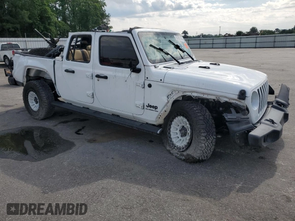 2020 Jeep Gladiator Sport S with VIN 1C6HJTAG5LL109304, listed as a Copart auction lot 55290145 with 83,771 mi miles and Salvage title. Bid and sale history available at DreamBid. Image 4.