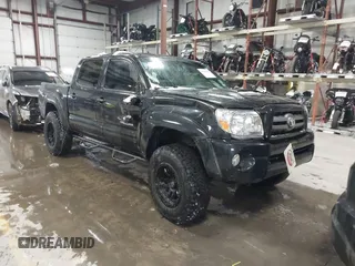 2009 Toyota Tacoma with VIN 3TMLU42N79M027885, listed as a IAAI auction lot 41146330 with 261,832 mi miles and . Bid and sale history available at DreamBid. Image 1.