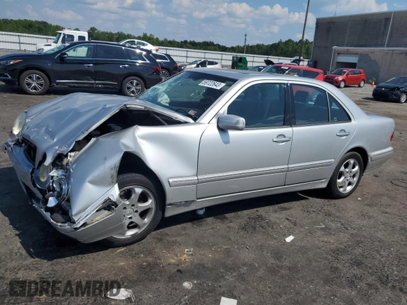 2002 Mercedes-Benz E-Class with VIN WDBJF65J12B393729, listed as a Copart auction lot 59722643 with 289,974 mi miles and Salvage Title. Bid and sale history available at carsss.com. Image 1.