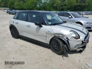 2015 MINI Hardtop 4 Door S with VIN WMWXU3C5XF2B56555, listed as a Copart auction lot 58775215 with 101,426 mi miles and Clean title. Bid and sale history available at DreamBid. Image 4.