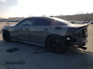 2019 Dodge Charger Scat Pack with VIN 2C3CDXGJ3KH568402, listed as a Copart auction lot 51078085 with 101,602 mi miles and Salvage Title. Bid and sale history available at DreamBid. Image 2.