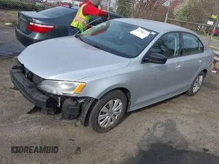 2014 Volkswagen Jetta S with VIN 3VW2K7AJ7EM313535, listed as a IAAI auction lot 41786112 with 63,694 mi miles and . Bid and sale history available at DreamBid. Image 17.