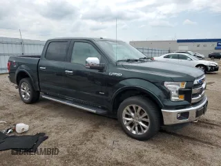 2015 Ford F-150 XLT with VIN 1FTEW1EG0FKD21372, listed as a Copart auction lot 61355525 with 172,421 mi miles and Salvage title. Bid and sale history available at DreamBid. Image 4.