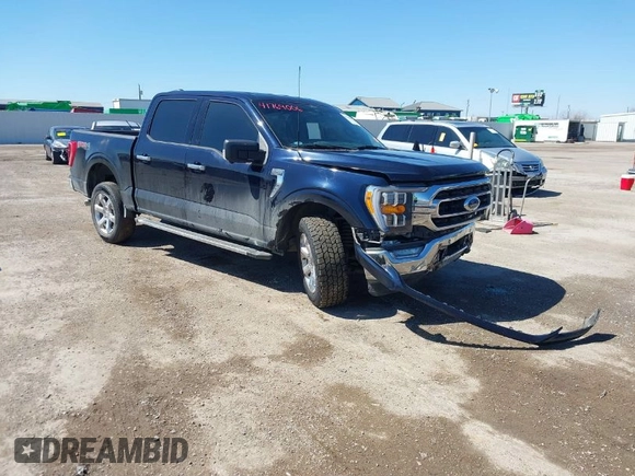 2022 Ford F-150 XL with VIN 1FTFW1E82NKD87353, listed as a IAAI auction lot 41769006 with 69,913 mi miles. Bid and sale history available at carsss.com. Image 1.