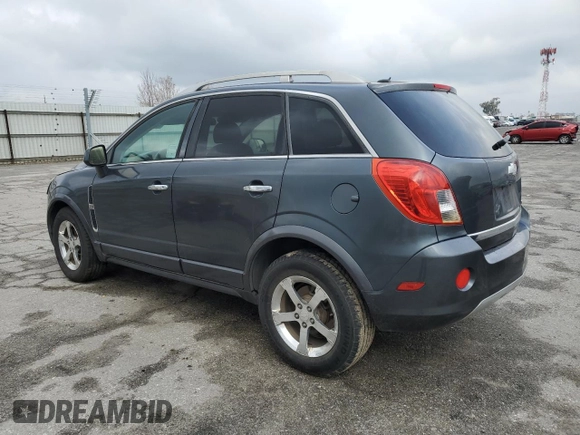 2013 Chevrolet Captiva Sport LT with VIN 3GNAL3EK1DS581084, listed as a Copart auction lot 82809984 with 153,173 mi miles and Salvage Title. Bid and sale history available at DreamBid. Image 2.