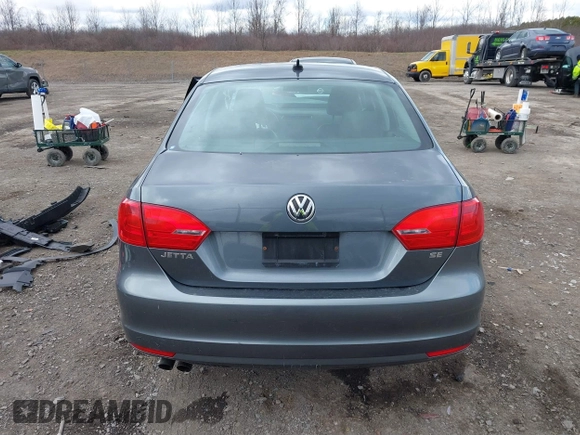 2014 Volkswagen Jetta SE z VIN 3VWD17AJ9EM358777, wystawiony jako IAAI lot #41880077 z przebiegiem 161 985 mil mil oraz . Historia ofert i sprzedaży dostępna na DreamBid. Obrazek 17.