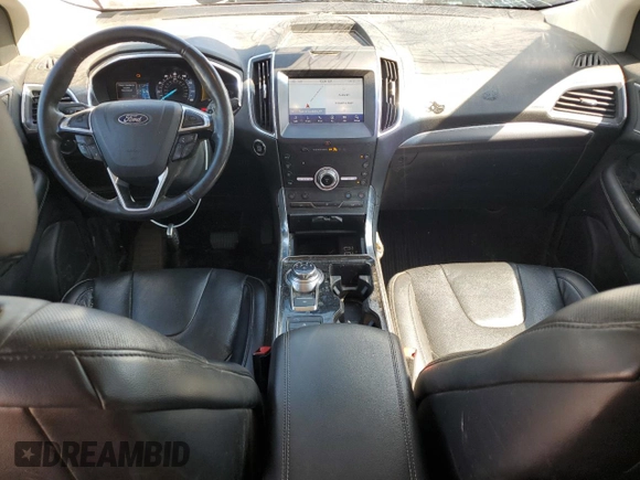 2020 Ford Edge Titanium with VIN 2FMPK4K93LBA02724, listed as a Copart auction lot 62760535 with 127,634 mi miles and Salvage title. Bid and sale history available at DreamBid. Image 8.