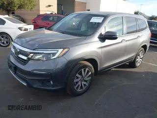 2021 Honda Pilot EX-L with VIN 5FNYF5H54MB018846, listed as a IAAI auction lot 41208987 with 80,757 mi miles and . Bid and sale history available at DreamBid. Image 18.