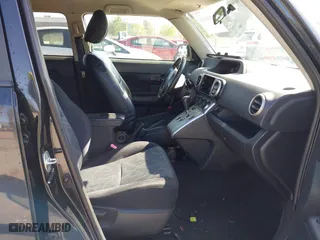 2012 Scion xB with VIN JTLZE4FE4C1143412, listed as a IAAI auction lot 42091929 with 213,501 mi miles. Bid and sale history available at carsss.com. Image 5.