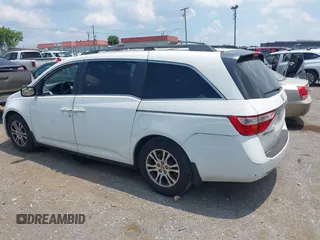 2012 Honda Odyssey EX-L with VIN 5FNRL5H63CB063684, listed as a IAAI auction lot 42576742 with 170,656 mi miles and . Bid and sale history available at DreamBid. Image 14.