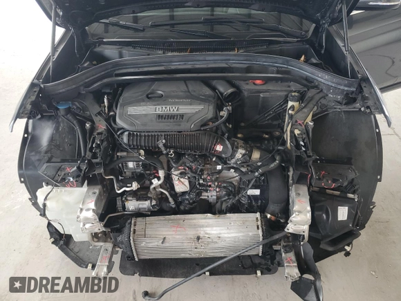 2022 BMW X1 xDrive28i z VIN WBXJG9C05N5U77973, wystawiony jako Copart lot #56828995 z przebiegiem 14 448 mil mil oraz Szkoda całkowita • Salvage title. Historia ofert i sprzedaży dostępna na DreamBid. Obrazek 12.