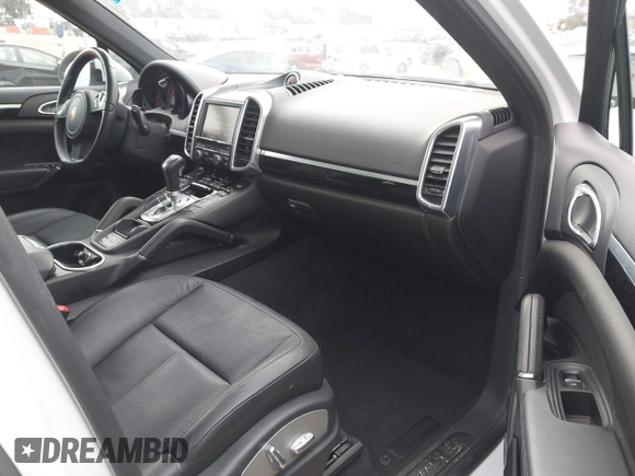 2014 Porsche Cayenne S Hybrid with VIN WP1AE2A28ELA51123, listed as a IAAI auction lot 42091475 with 41,341 mi miles and . Bid and sale history available at DreamBid. Image 5.
