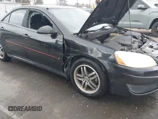 2009 Pontiac G6 1SB with VIN 1G2ZJ57B594263412, listed as a IAAI auction lot 41844953 with 234,057 mi miles and . Bid and sale history available at DreamBid. Image 6.