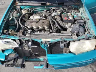 1995 Ford Escort z VIN 1FASP14J9SW128191, wystawiony jako Copart lot #75688724 z przebiegiem 85 423 mil mil oraz Tytuł czysty. Historia ofert i sprzedaży dostępna na DreamBid. Obrazek 12.
