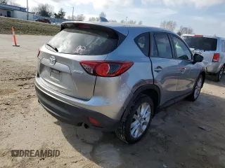 2014 Mazda CX-5 Grand Touring with VIN JM3KE4DY0E0384507, listed as a Copart auction lot 45320964 with 178,038 mi miles and Clean Title. Bid and sale history available at carsss.com. Image 3.
