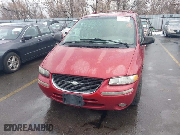 1999 Chrysler Town & Country with VIN 1C4GT64L7XB723937, listed as a IAAI auction lot 41609957 with 242,800 mi miles and . Bid and sale history available at DreamBid. Image 6.