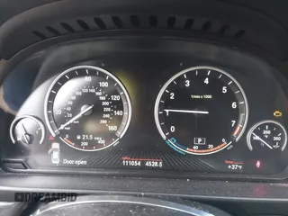 2015 BMW 5 Series 528i xDrive with VIN WBA5A7C5XFD624325, listed as a IAAI auction lot 41528322 with 111,054 mi miles and . Bid and sale history available at carsss.com. Image 7.