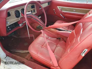 1977 Ford Mustang z VIN 7F04Z150204, wystawiony jako Copart lot #77276344 z przebiegiem 94 802 mil mil oraz Szkoda całkowita • Salvage title. Historia ofert i sprzedaży dostępna na DreamBid. Obrazek 7.
