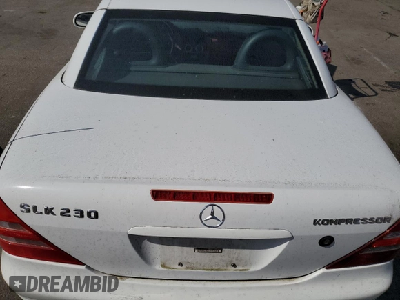 1999 Mercedes-Benz SLK-Class with VIN WDBKK47F9XF130501, listed as a Copart auction lot 71770824 with 124,669 mi miles and Clean Title. Bid and sale history available at carsss.com. Image 10.