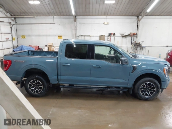 2023 Ford F-150 XL z VIN 1FTFW1E80PKG11643, wystawiony jako IAAI lot #42567764 z przebiegiem 6 448 mil mil oraz . Historia ofert i sprzedaży dostępna na DreamBid. Obrazek 14.
