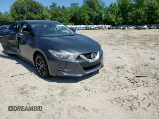 2016 Nissan Maxima SR with VIN 1N4AA6AP1GC428108, listed as a Copart auction lot 57221335 with 90,473 mi miles and Salvage title. Bid and sale history available at DreamBid. Image 14.