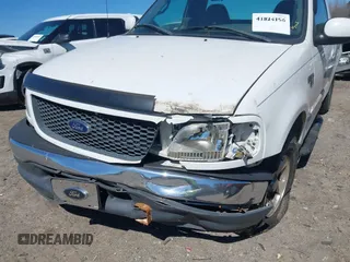 2001 Ford F-150 XL z VIN 1FTRF17W61NB22632, wystawiony jako IAAI lot #41824156 z przebiegiem Nie podano mil oraz . Historia ofert i sprzedaży dostępna na DreamBid. Obrazek 6.