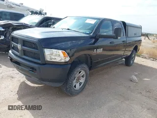 2018 Ram 2500 Tradesman with VIN 3C6UR5HL4JG287883, listed as a IAAI auction lot 42458530 with 100,826 mi miles and . Bid and sale history available at DreamBid. Image 2.