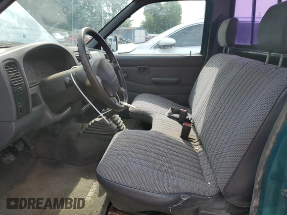 1997 Nissan Frontier XE with VIN 1N6SD11Y4VC346711, listed as a Copart auction lot 61025615 with 100,417 mi miles and Clean title. Bid and sale history available at DreamBid. Image 7.