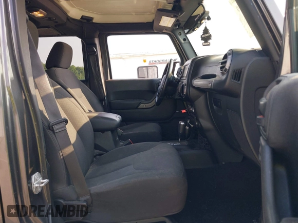 2018 Jeep Wrangler Unlimited Sport S with VIN 1C4BJWDG6JL854359, listed as a IAAI auction lot 42423170 with 84,470 mi miles and . Bid and sale history available at DreamBid. Image 5.
