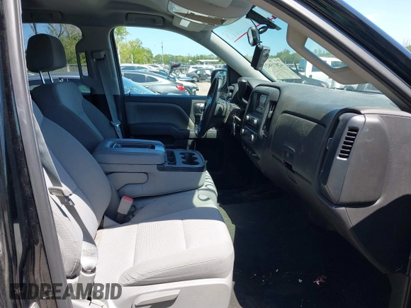 2015 Chevrolet Silverado 1500 LS with VIN 1GCRCPEH6FZ398471, listed as a IAAI auction lot 42015821 with 126,679 mi miles and . Bid and sale history available at DreamBid. Image 5.